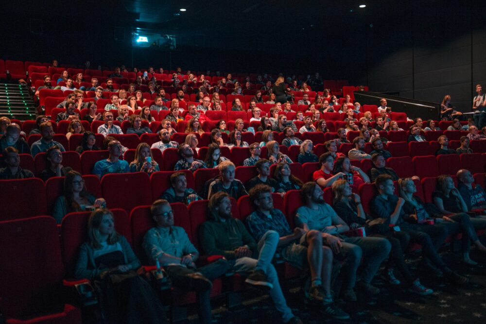 audience watching a movie in a theater
