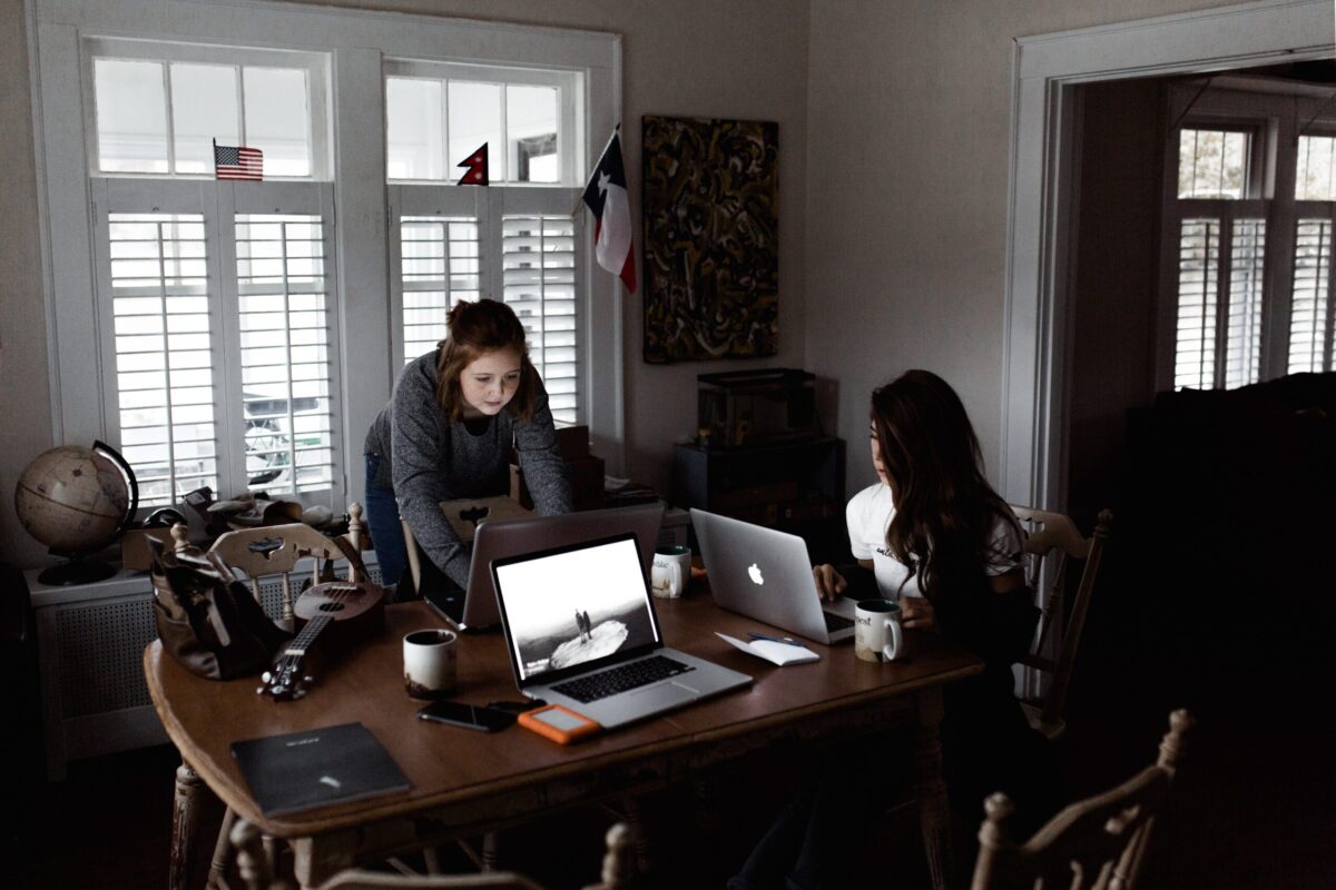 freelance team sitting at a table working from home