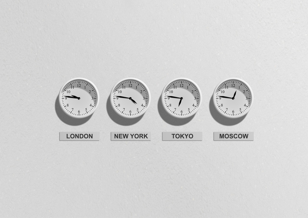 wall of clocks in different time zones