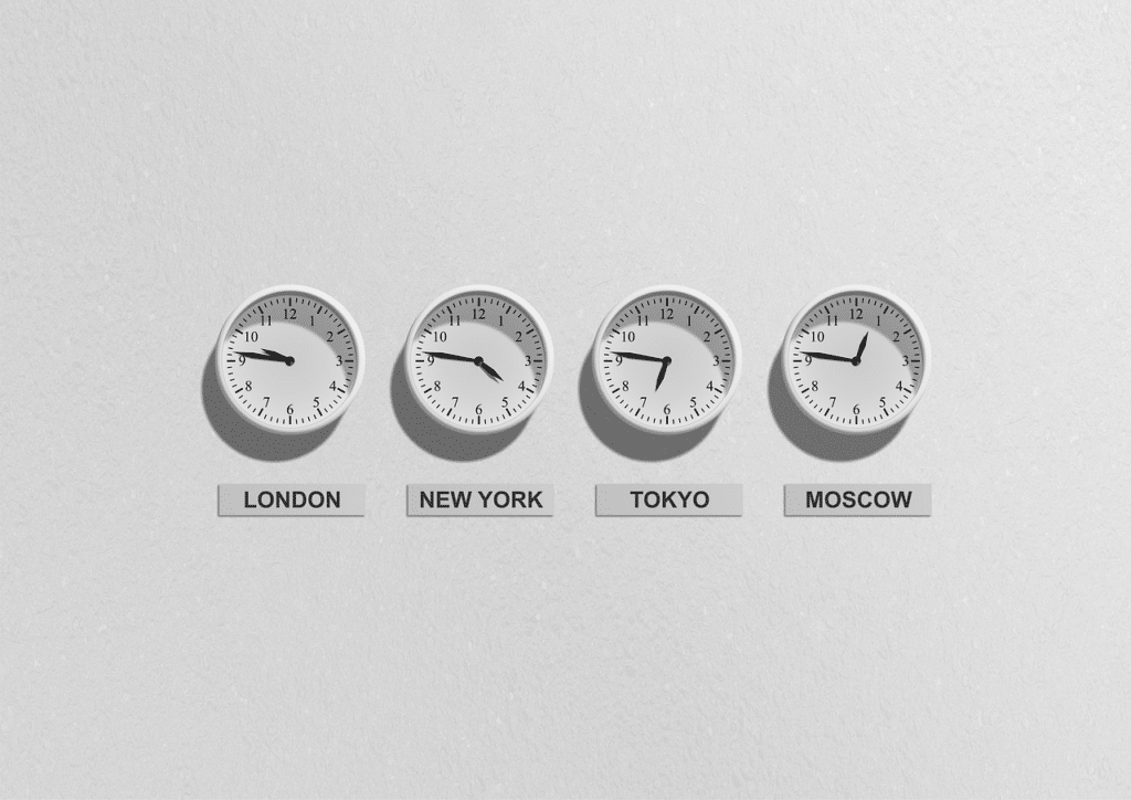 wall of clocks in different time zones